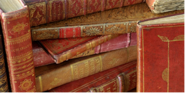 Stack of leather-bound books, mostly eighteenth-century in calf and red morocco